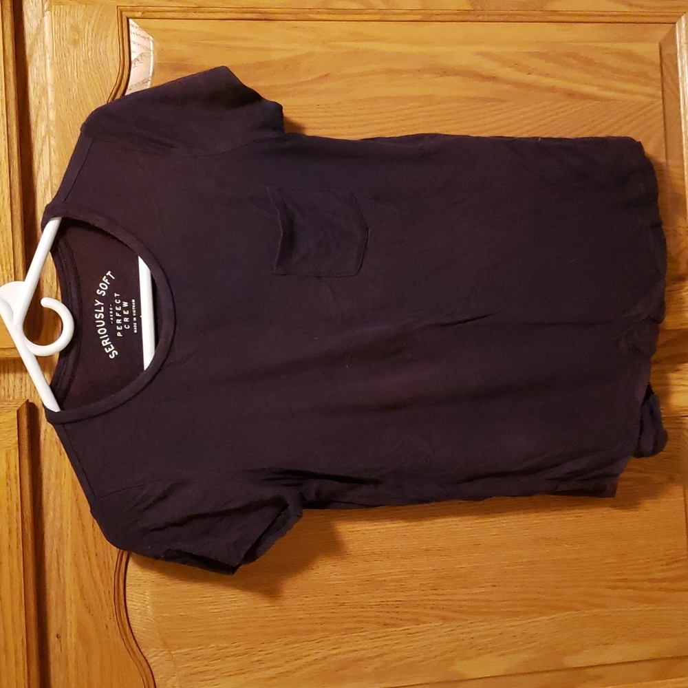 Like new T with pocket on front. Stretchy and comfy. Little tie dye effect